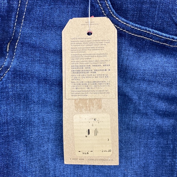 Levi’s mid length shorts mid rise slim through hip size 2 W26 NWT - Picture 4 of 10